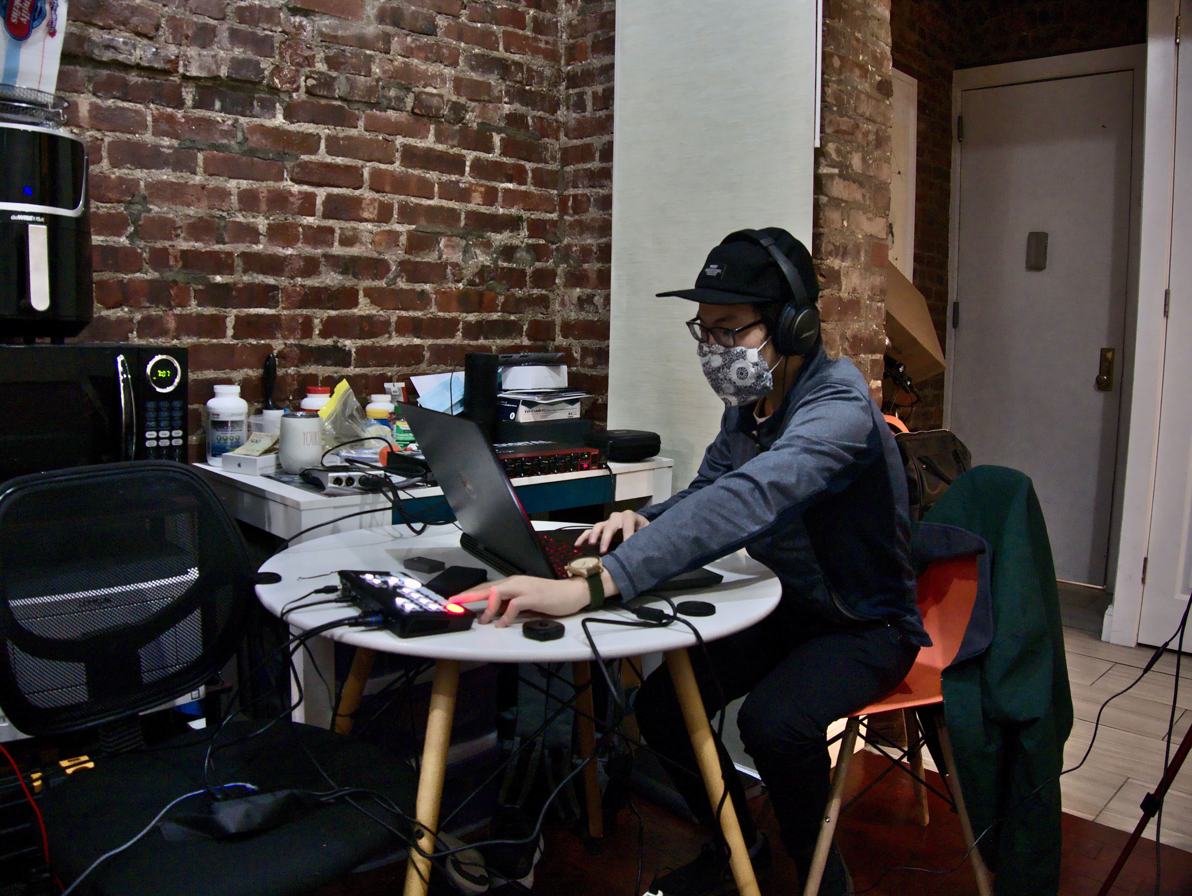 Austin operating a video switcher at a live event